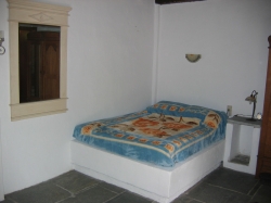 This spacious apartment has a comfortable double bed,